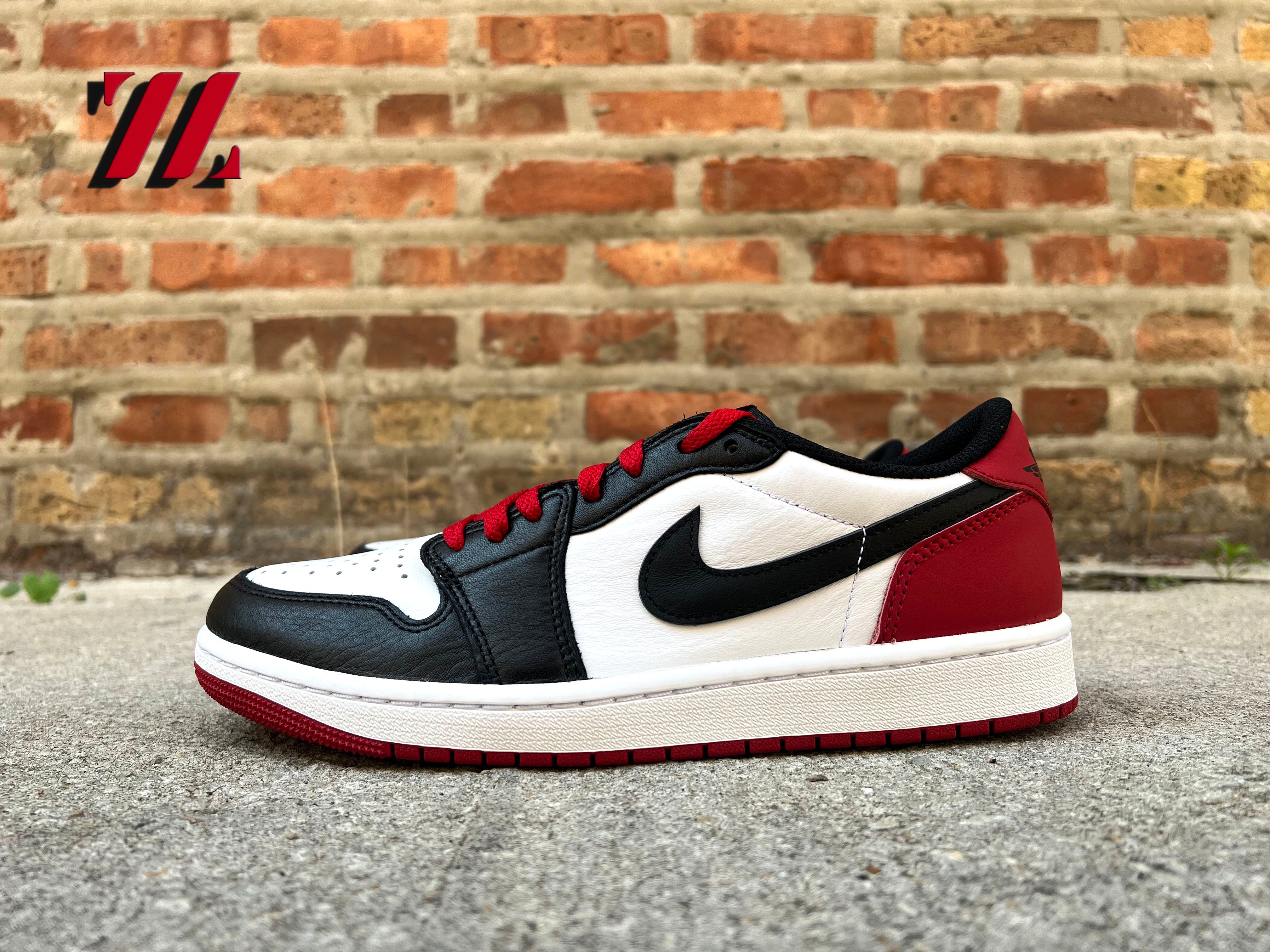 Jordan 1 low gs hotsell black toe